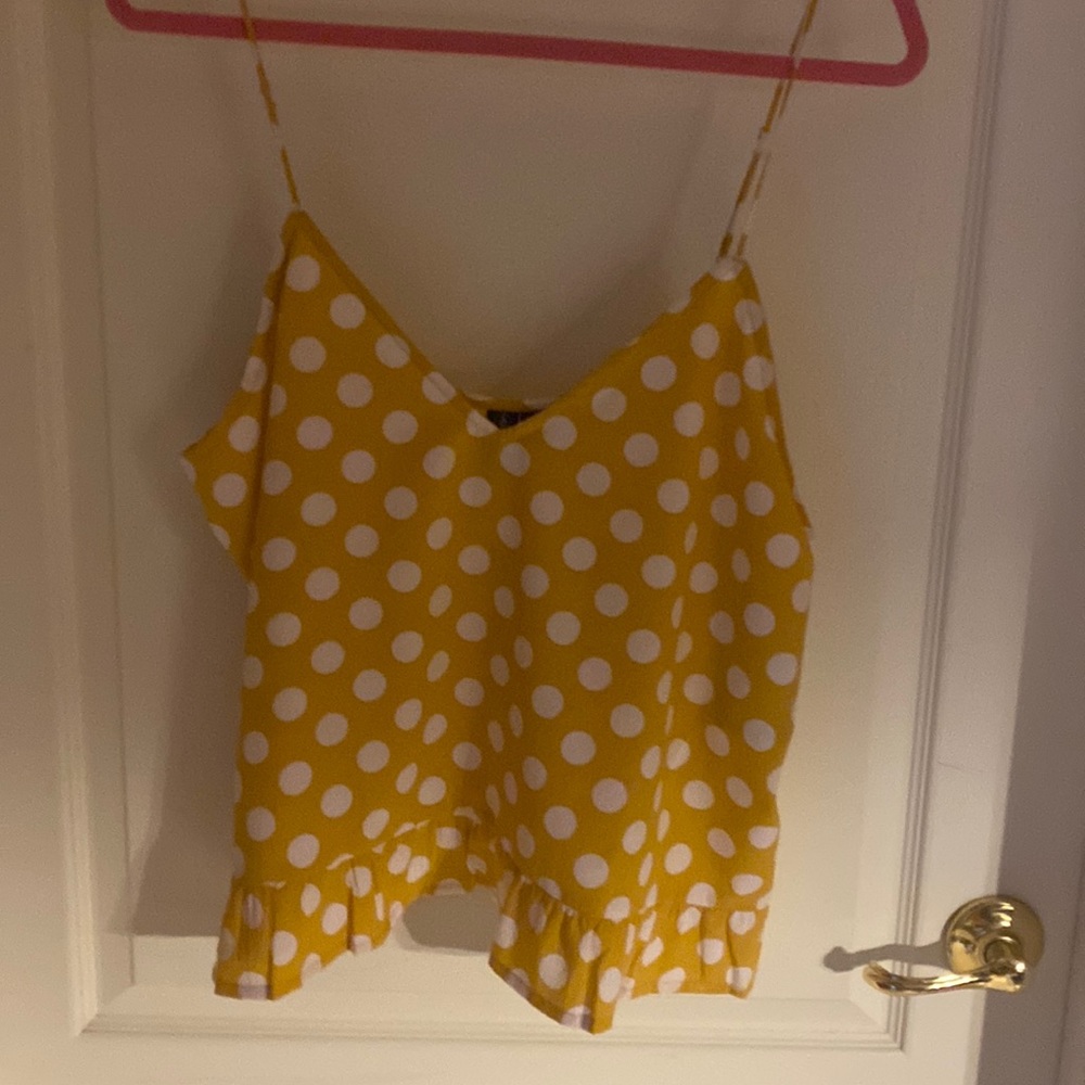 Volcom yellow/gold with  white poka dots and it’s a adorable top